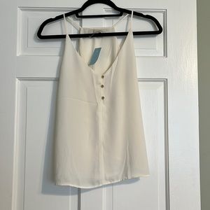 Loft cream colored tank top with gold button detailing. Size Small petite.